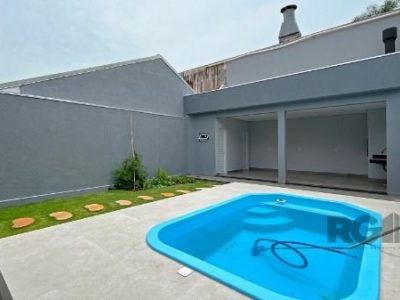 Casa à venda com 204m², 3 quartos, 2 suítes, 2 vagas no bairro Ipanema em Porto Alegre - Foto 31