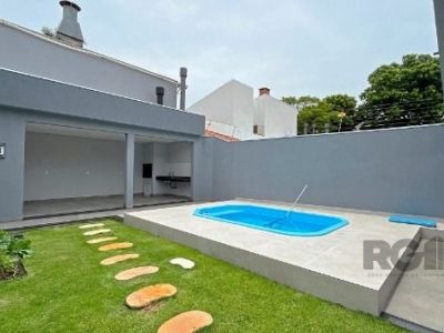 Casa à venda com 204m², 3 quartos, 2 suítes, 2 vagas no bairro Ipanema em Porto Alegre - Foto 32