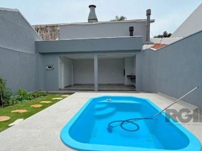 Casa à venda com 204m², 3 quartos, 2 suítes, 2 vagas no bairro Ipanema em Porto Alegre - Foto 33