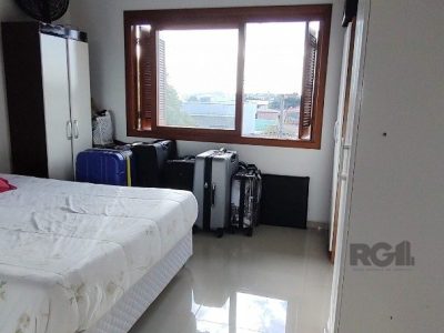 Casa à venda com 215m², 3 quartos, 3 suítes, 3 vagas no bairro Tristeza em Porto Alegre - Foto 24