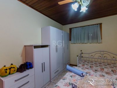 Casa à venda com 518m², 4 quartos, 2 suítes, 4 vagas no bairro Partenon em Porto Alegre - Foto 25