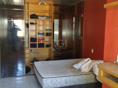 Casa Condominio à venda com 250m², 4 quartos, 4 suítes, 2 vagas no bairro Santo Antônio em Porto Alegre - Foto 27