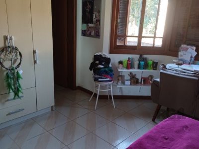 Casa à venda com 250m², 3 quartos, 3 suítes, 3 vagas no bairro Partenon em Porto Alegre - Foto 22