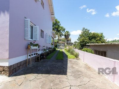 Sobrado à venda com 284m², 4 quartos, 1 suíte, 5 vagas no bairro Santa Tereza em Porto Alegre - Foto 54