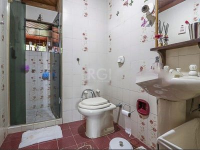 Casa à venda com 350m², 4 quartos, 1 suíte, 2 vagas no bairro Chácara das Pedras em Porto Alegre - Foto 13