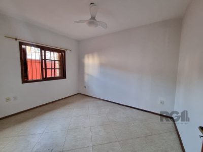 Casa à venda com 98m², 2 quartos, 1 suíte, 3 vagas no bairro Ipanema em Porto Alegre - Foto 8