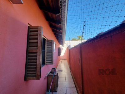 Casa à venda com 98m², 2 quartos, 1 suíte, 3 vagas no bairro Ipanema em Porto Alegre - Foto 12