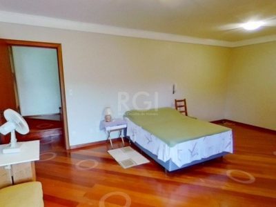 Casa à venda com 310m², 4 quartos, 2 suítes, 4 vagas no bairro Jardim Itu em Porto Alegre - Foto 16