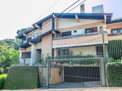 Casa à venda com 523m², 6 quartos, 3 suítes, 6 vagas no bairro Jardim Itu em Porto Alegre - Foto 4