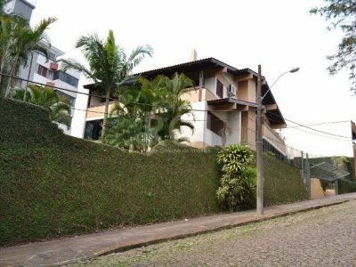 Casa à venda com 523m², 6 quartos, 3 suítes, 6 vagas no bairro Jardim Itu em Porto Alegre - Foto 3