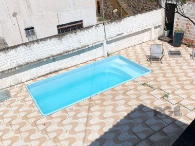 Casa à venda com 150m², 3 quartos, 1 suíte, 4 vagas no bairro Glória em Porto Alegre - Foto 22