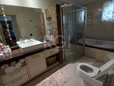 Casa à venda com 283m², 4 quartos, 2 suítes, 4 vagas no bairro Santa Tereza em Porto Alegre - Foto 31