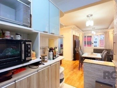 Apartamento à venda com 77m², 3 quartos, 1 suíte, 2 vagas no bairro Jardim Botânico em Porto Alegre - Foto 9