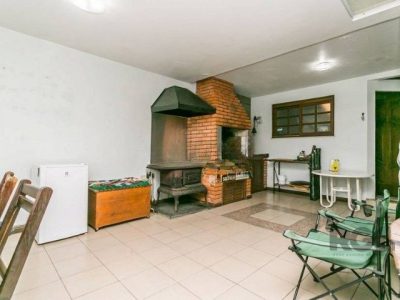 Casa à venda com 341m², 4 quartos, 1 suíte, 4 vagas no bairro Passo d'Areia em Porto Alegre - Foto 17