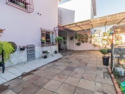 Casa à venda com 215m², 4 quartos, 4 vagas no bairro Santa Tereza em Porto Alegre - Foto 25