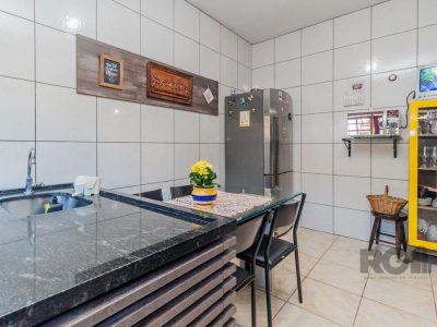 Casa à venda com 215m², 4 quartos, 4 vagas no bairro Santa Tereza em Porto Alegre - Foto 9