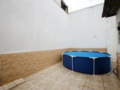 Casa à venda com 88m², 3 quartos, 1 suíte, 2 vagas no bairro Partenon em Porto Alegre - Foto 5