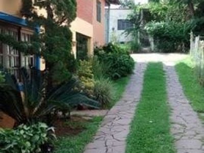 Casa à venda com 250m², 3 quartos no bairro Santa Tereza em Porto Alegre - Foto 4