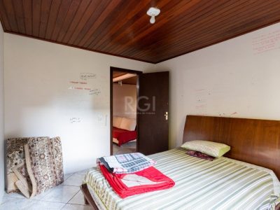 Casa à venda com 240m², 6 quartos, 3 suítes, 2 vagas no bairro Glória em Porto Alegre - Foto 33