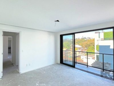 Apartamento à venda com 75m², 2 quartos, 1 suíte, 2 vagas no bairro Menino Deus em Porto Alegre - Foto 4