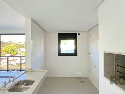 Apartamento à venda com 75m², 2 quartos, 1 suíte, 2 vagas no bairro Menino Deus em Porto Alegre - Foto 5