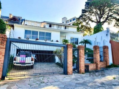 Casa à venda com 450m², 4 quartos, 2 suítes, 4 vagas no bairro Três Figueiras em Porto Alegre - Foto 6