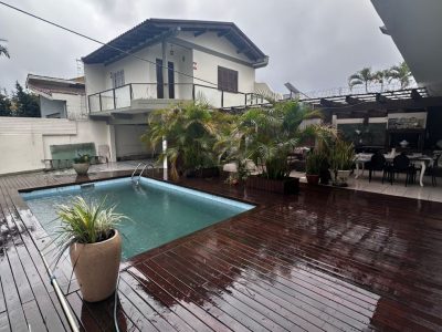 Casa à venda com 367m², 3 quartos, 2 suítes, 3 vagas no bairro Ipanema em Porto Alegre - Foto 3