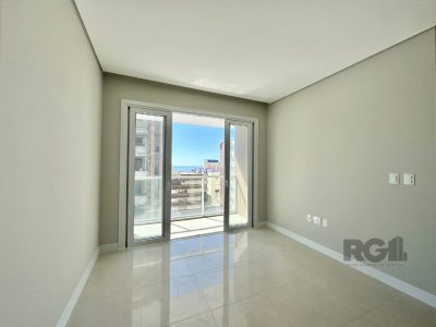 Apartamento à venda com 72m², 2 quartos, 1 suíte, 1 vaga no bairro Centro em Capão da Canoa - Foto 4