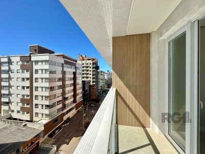 Apartamento à venda com 72m², 2 quartos, 1 suíte, 1 vaga no bairro Centro em Capão da Canoa - Foto 7