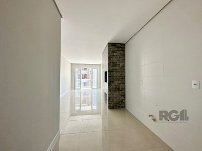 Apartamento à venda com 72m², 2 quartos, 1 suíte, 1 vaga no bairro Centro em Capão da Canoa - Foto 11