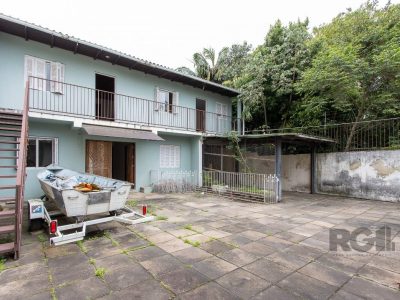 Casa à venda com 220m², 5 quartos, 2 vagas no bairro Ipanema em Porto Alegre - Foto 27