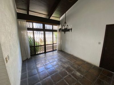 Casa à venda com 280m², 4 quartos, 1 suíte, 4 vagas no bairro Três Figueiras em Porto Alegre - Foto 16