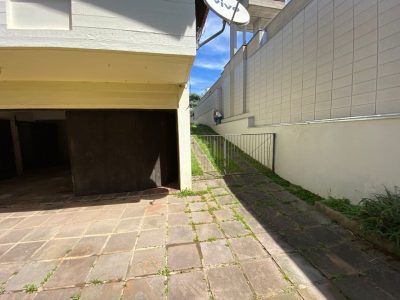 Casa à venda com 280m², 4 quartos, 1 suíte, 4 vagas no bairro Três Figueiras em Porto Alegre - Foto 54