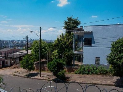 Casa à venda com 177m², 4 quartos, 2 suítes, 6 vagas no bairro Santa Tereza em Porto Alegre - Foto 4