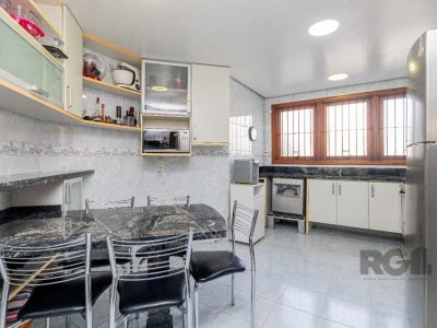 Casa à venda com 304m², 4 quartos, 2 suítes, 3 vagas no bairro Jardim Lindóia em Porto Alegre - Foto 27