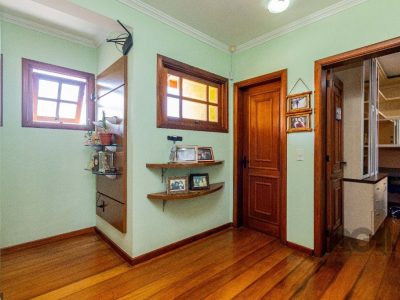 Casa à venda com 304m², 4 quartos, 2 suítes, 3 vagas no bairro Jardim Lindóia em Porto Alegre - Foto 33