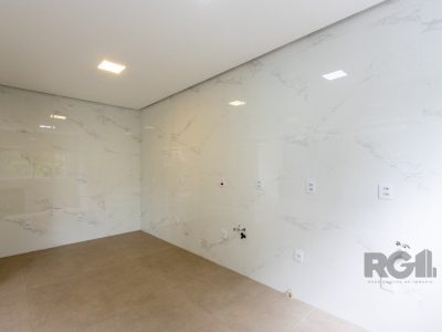 Casa à venda com 260m², 3 quartos, 2 suítes, 4 vagas no bairro Santa Tereza em Porto Alegre - Foto 12