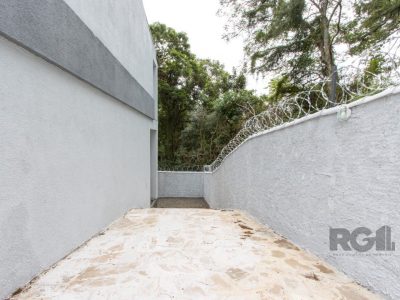 Casa à venda com 260m², 3 quartos, 2 suítes, 4 vagas no bairro Santa Tereza em Porto Alegre - Foto 38