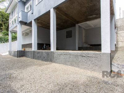 Casa à venda com 260m², 3 quartos, 2 suítes, 4 vagas no bairro Santa Tereza em Porto Alegre - Foto 42