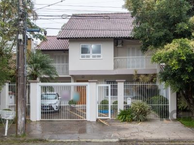 Casa à venda com 309m², 3 quartos, 2 suítes, 3 vagas no bairro Ipanema em Porto Alegre - Foto 2