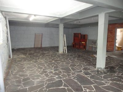 Casa à venda com 306m², 3 quartos, 1 suíte, 1 vaga no bairro Vila Ipiranga em Porto Alegre - Foto 5