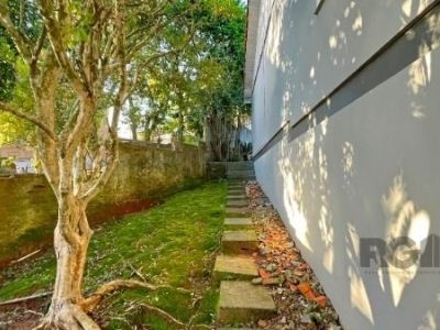 Casa à venda com 206m², 3 quartos, 1 suíte, 4 vagas no bairro Ipanema em Porto Alegre - Foto 12