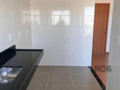 Apartamento à venda com 53m², 2 quartos, 1 suíte, 1 vaga no bairro Jardim Carvalho em Porto Alegre - Foto 4