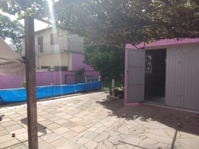 Casa à venda com 206m², 5 quartos, 1 suíte, 4 vagas no bairro Santa Tereza em Porto Alegre - Foto 24