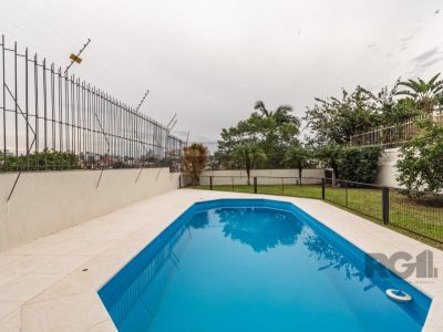 Casa à venda com 484m², 4 quartos, 2 suítes, 8 vagas no bairro Chácara das Pedras em Porto Alegre - Foto 63