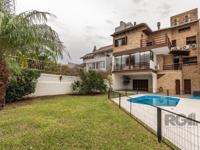 Casa à venda com 484m², 4 quartos, 2 suítes, 8 vagas no bairro Chácara das Pedras em Porto Alegre - Foto 64