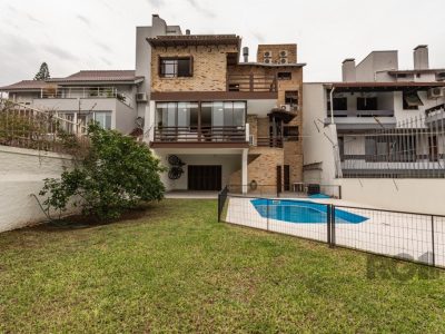 Casa à venda com 484m², 4 quartos, 2 suítes, 8 vagas no bairro Chácara das Pedras em Porto Alegre - Foto 65