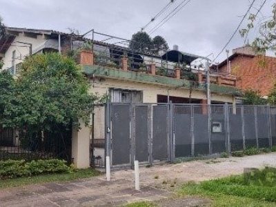 Casa à venda com 360m², 4 quartos, 2 suítes, 5 vagas no bairro Chácara das Pedras em Porto Alegre - Foto 2