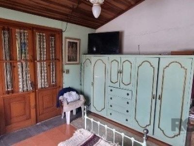 Casa à venda com 360m², 4 quartos, 2 suítes, 5 vagas no bairro Chácara das Pedras em Porto Alegre - Foto 28