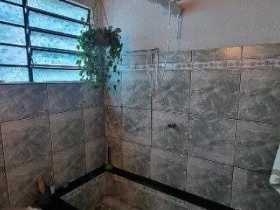 Casa à venda com 360m², 4 quartos, 2 suítes, 5 vagas no bairro Chácara das Pedras em Porto Alegre - Foto 30